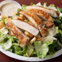 Chicken Caesar Salad · Marinated grilled chicken, crisp romaine lettuce, croutons, Parmesan cheese and creamy caesa...