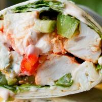 Buffalo Chicken Wrap · Grilled chicken, lettuce, tomatoes, red onions, blue cheese dressing and buffalo sauce.