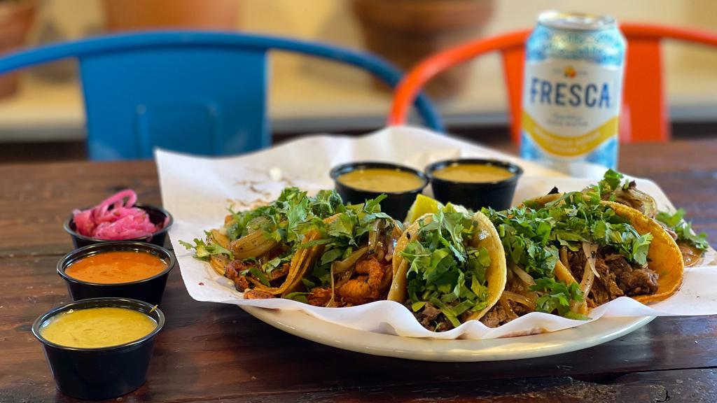 Street Tacos · Your choice of meat served with cilantro, onion, and salsa on the side.
