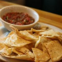 Chips And Salsa · Chips with 8oz our of salsa fresca.
