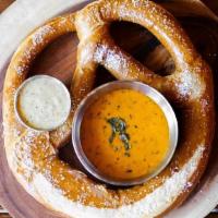 Giant Munich Pretzel · Giant pretzel served with beer cheese and beer mustard.