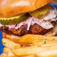 Nashville Hot Chicken Sandwich · breaded chicken breast, fried and tossed in original Nashville spicy sauce, topped wit coles...