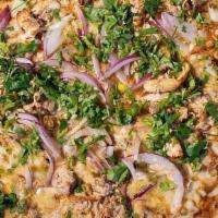 Bbq Chicken Pizza · roasted chicken, red onions, smoked gouda, cilantro, mozzarella cheese, and house-made BBQ s...