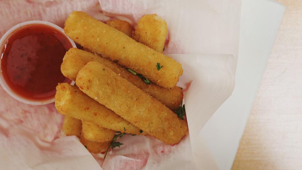 Mozzarella Cheese Sticks · Vegetarian friendly. Breaded mozzarella sticks served with ranch dressing or marinara. Add extra sauce for an additional charge.