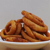 Basket Of Onion Rings · Vegetarian friendly. Battered onion rings. Add extra sauce for an additional charge.