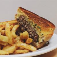 Holland Patty Melt · 1/2 lb. Angus beef burger with sautéed onions and melted Holland cheese on grilled rye bread...