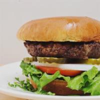 Beef Burger · 1/2 lb. ground Angus beef with lettuce, tomato, and onion on a brioche bun with pommes frite...