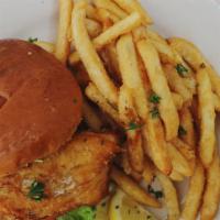 Fish Sandwich · Beer-battered Icelandic cod with lettuce, tomato and tartar sauce served on a brioche bun wi...