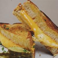 Grilled Three-Cheese Sandwich · Vegetarian friendly. Holland, American, and Cheddar cheeses. Add bacon, tomato, or onions fo...