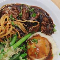 Steak Tip Dinner · Feather Bowler's Belgian ale marinated Angus beef steak tips, topped with frizzled onions, s...