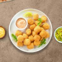 You'Re Such A Tater · Shredded Idaho potatoes formed into tots, battered, and fried until golden brown. Served wit...
