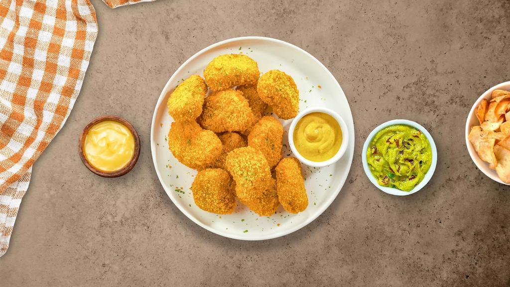 International Court Of Chicken Nuggets · Bite sized nuggets of chicken breaded and fried until golden brown. Served with your choice of sauce.