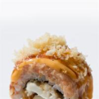 Lake Dallas Roll · Red snapper tempura, crab topped with spicy tuna, crunch, eel sauce, and spicy mayo.