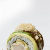 Tempura Dragon Roll · Shrimp tempura and avocado inside. Topped avocado, crunch, and eel sauce.
