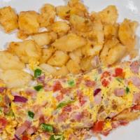Western Omelette Breakfast · Ham, tomatoes, onions and peppers.