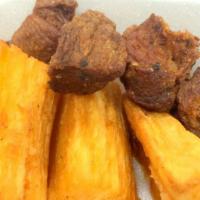 6- Yuca Con Chicharron · Fried cassava and fried pork.