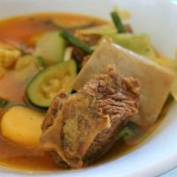 86- Sopa De Res · Homemade beef soup with vegetables.