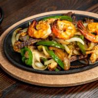 Fajita Grilled Steak · Fajita Grilled Steak- Served sizzling with green peppers, onions, and tomatoes. Accompanied ...