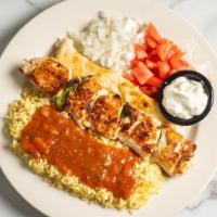 Chicken Kabob · Served with rice and pita bread