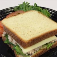 Classic Tuna Salad - Deluxe · Classic White bread, the best fancy white albacore tuna with Havarti cheese and tomatoes.  I...