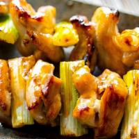 Yakitori · Two pan fried skewers of all natural chicken cubes with scallions and Sushi-Zen™ gluten free...