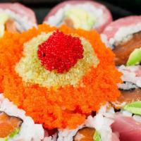 Cherry Blossom Roll · 8 Pieces- Fresh salmon, avocado inside wrapped with tuna, topped with tobiko and spicy eel s...