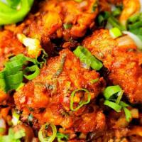 Gobhi Manchurian · Cauliflower fritter cooked in a ginger, garlic chili and coriander sauce. Vegetarian. Spicy.