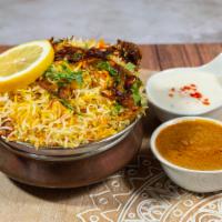 Hyderabadi Chicken Dum Biryani · Aromaticbasmati rice and chickenmeat cooked on dum over slow heat marinated with fresh herbs...