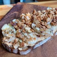 Nut Butter · Toast with choice of nut butter (cashew, peanut or almond), banana, granola. seedy mix up, h...