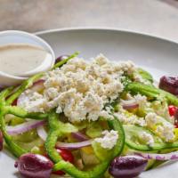 Greek · Garden salad topped with kalamata olives and feta cheese, served with Greek dressing.