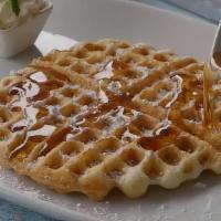 Belgium Waffle · Topped with powdered sugar.