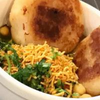 Tikki Chaat · Vegan. Gluten free. Potato patties in curried chickpeas, medley of chutneys, garnished with ...