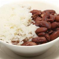 Rice And Beans · Fried white rice on top with kidney beans.