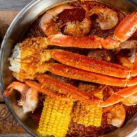 Combo #1 · One cluster snow crab leg, half pound headless shrimp, two corn and two potatoes.