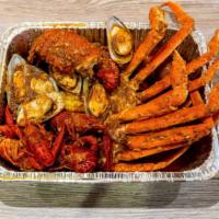 Combo  #6 · One lobster tail, one cluster snow crab leg, one pound headless shrimp, one pound crawfish, ...