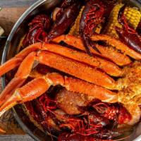 Combo  #2 · One cluster snow crab leg, half pound headless shrimp, half pound crawfish, two corn and two...