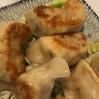 Pan Fried Shrimp Dumplings · Shell fish. stuffed dough.