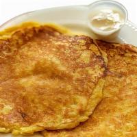 Chorreadas (1) · Sweet corn pancakes, served with sour cream. Add cheese for an additional charge.