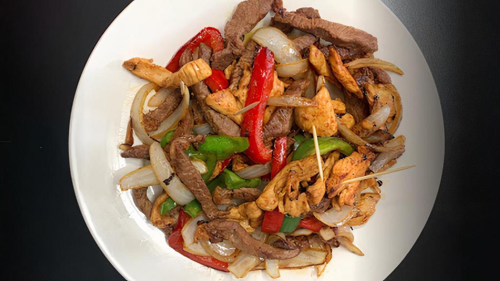 Mixed Fajitas · Chicken or Beef. Sautéed with peppers, onions served with corn tortillas.