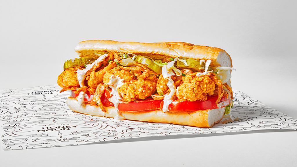 Shrimp Po Boy · Crispy cornmeal breaded shrimp, topped with pickles, crispy onions, tomato, lettuce and remoulade on a toasted hoagie roll . *contains shellfish and gluten