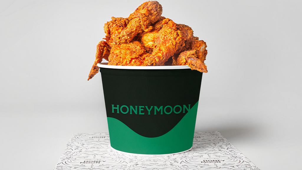 Honeymoon Chicken Bucket 8Pc (Whole Chicken) · A whole bird - two breasts, two wings, two drums and two thighs of our staple all natural cage free crispy chicken served either honey dusted or dipped in our signature hot honey. Served with 4 of our honey butter rolls.