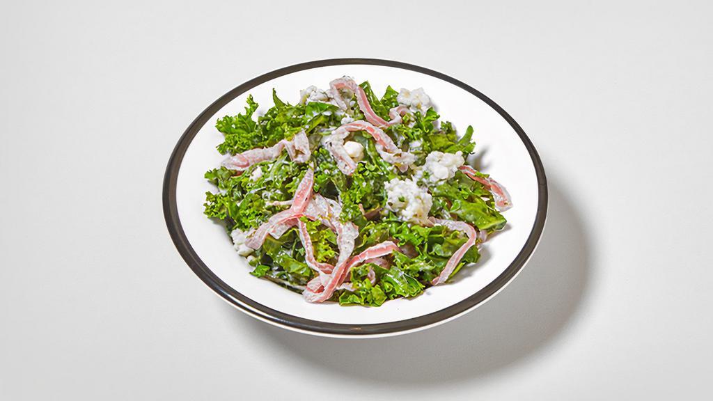 Kale - Blue Cheese Slaw · Shredded kale, pickled onions, herbs, creamy blue cheese dressing. *gluten free. *contains dairy
