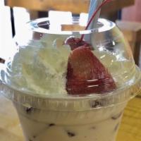 Loca Strawberry · It’s a yummy dessert, a half cup filled with strawberry with cream and the other half filled...