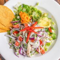 Ceviche Classico · Fresh white fish marinated in natural lemon juice, red onions, cilantro, ginger and jalapeño...