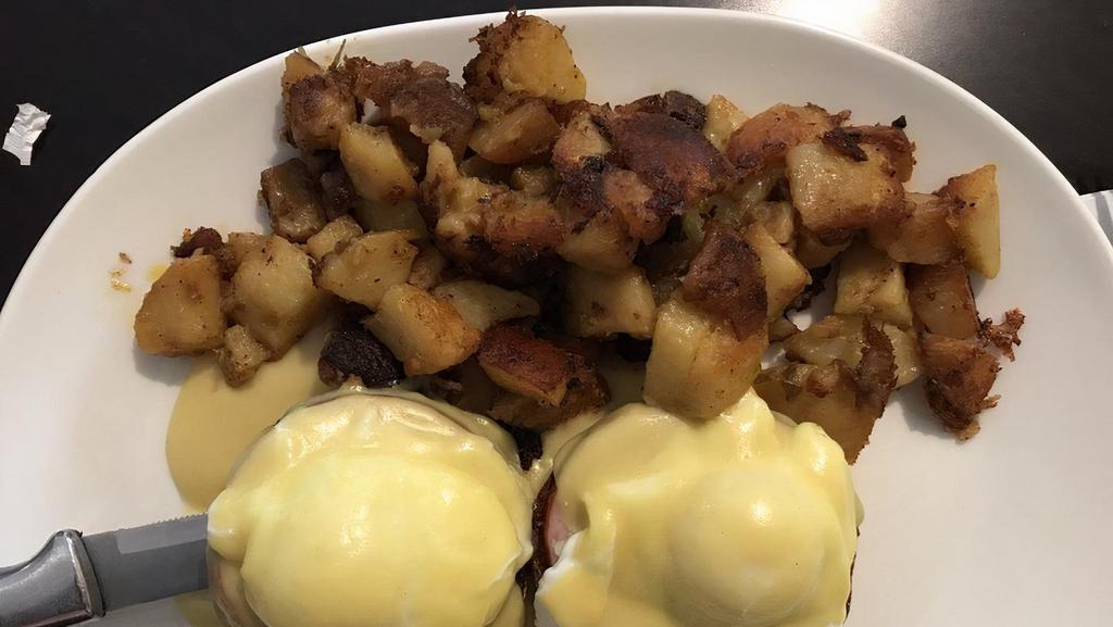 Benjamin · Two poached eggs with Canadian bacon on a toasted English muffin, topped with hollandaise sauce