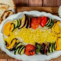 Grilled Vegetable Kabobs (Platter) · Tomato, onion, bell pepper, eggplant, and zucchini grilled and served on basmati rice.