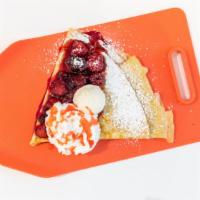 Berry Cheesecake · Waffle or crêpe topped with flavorful blueberries, cooked to perfection and drenched in swee...