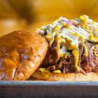 Carolina + 1 Side · Choice of meat, cole slaw, mustard BBQ drizzle