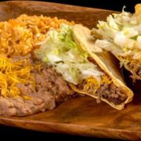 Two Beef Tacos · Served with Mexican style rice and beans.