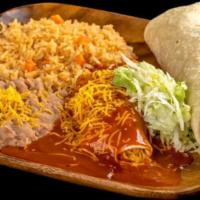 Burrito And Enchilada · Shredded beef burrito with bell peppers, tomatoes, and onions. Cheese enchilada with lettuce...